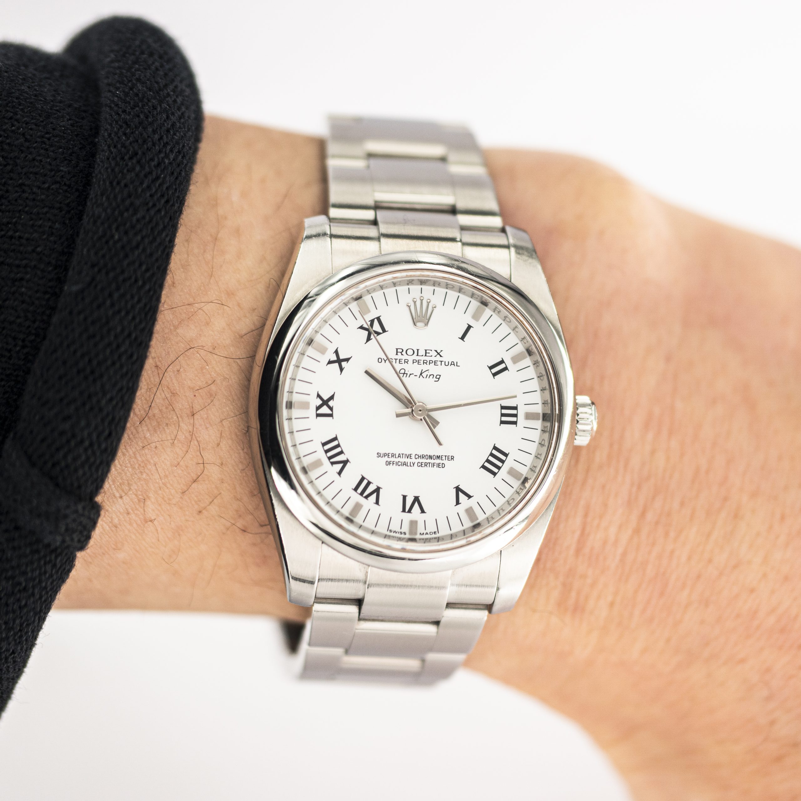 1258_marcels_watch_group_2010_pre-owned_rolex_114200_air_king_wrist_shot_01-scaled.jpg