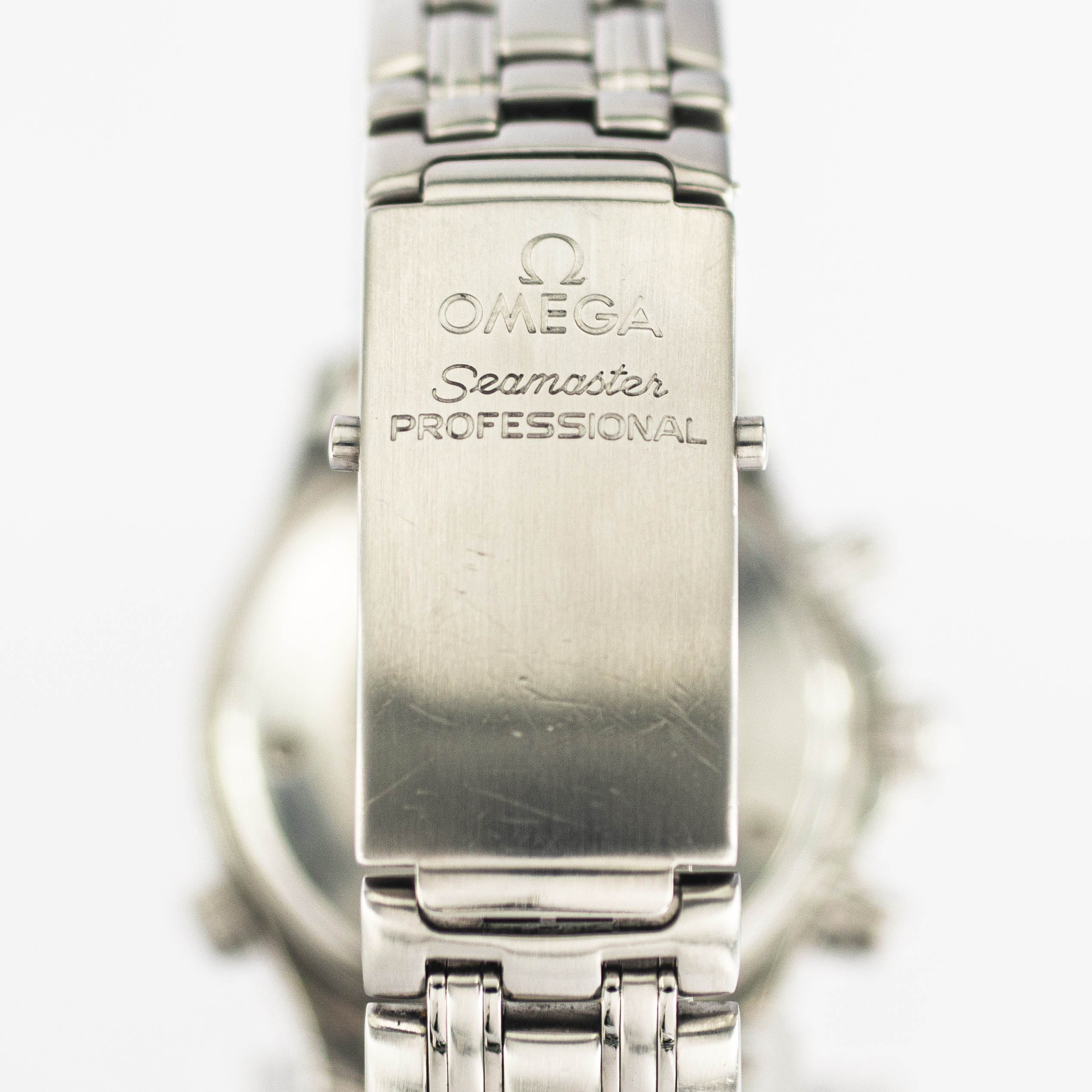 1283_marcels_watch_group_wrist_watch_1999_omega_2598.80professional_seamaster_300m_chronograph_buckle_01