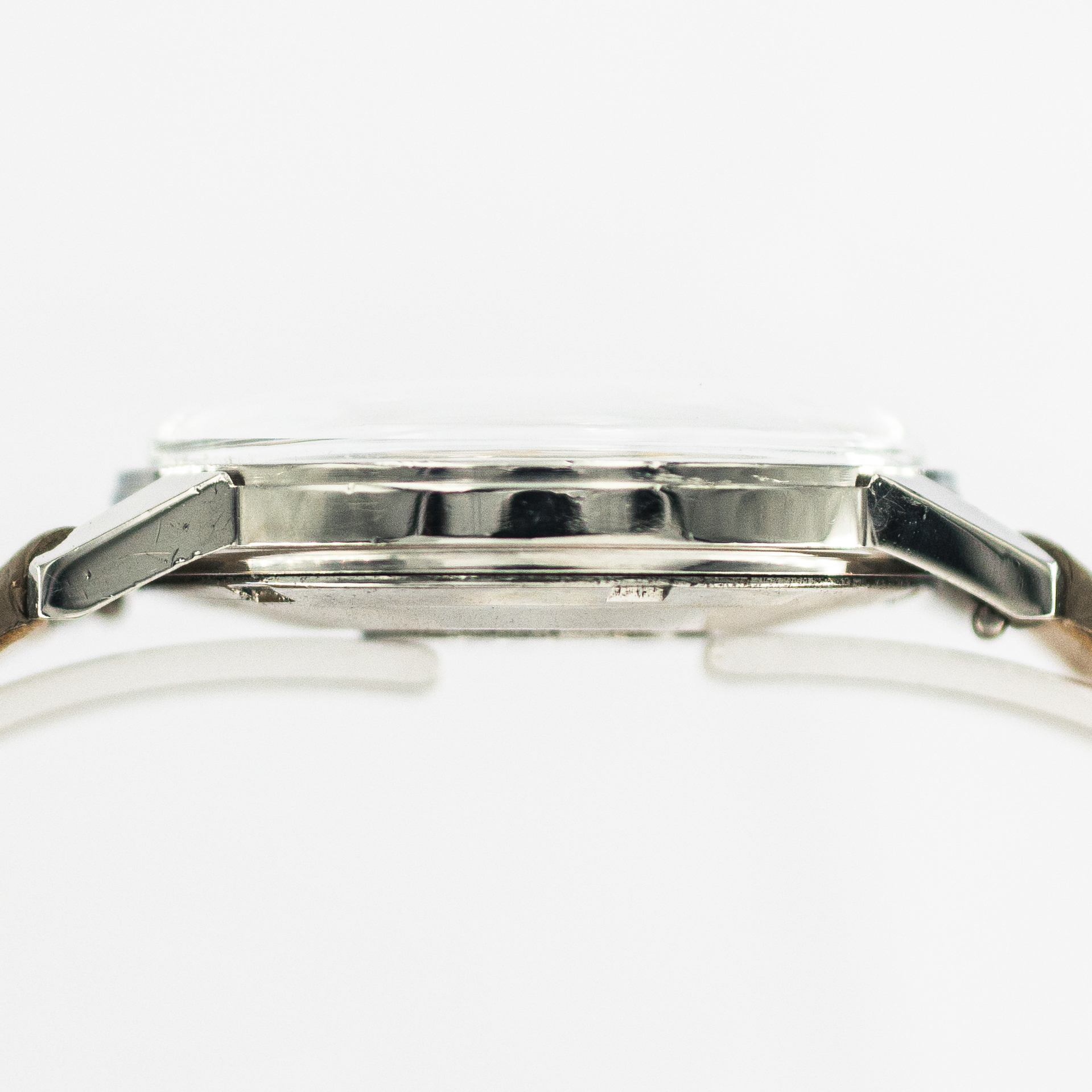 1348_marcels_watch_group_vintage_wristwatch_1963_omega_165.001_seamaster_case_side_05