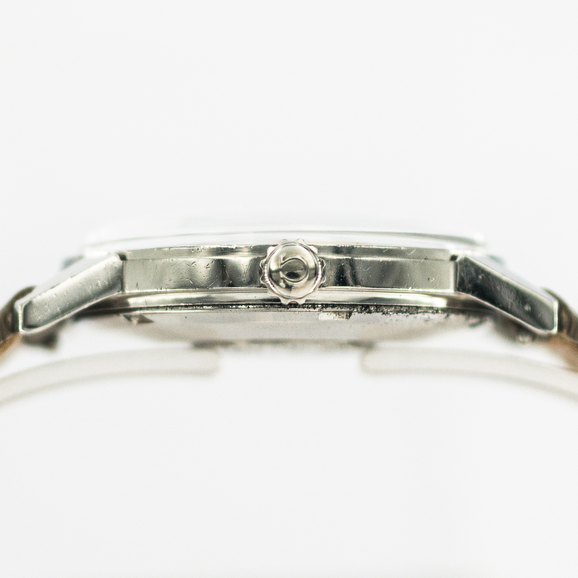 1348_marcels_watch_group_vintage_wristwatch_1963_omega_165.001_seamaster_case_side_10