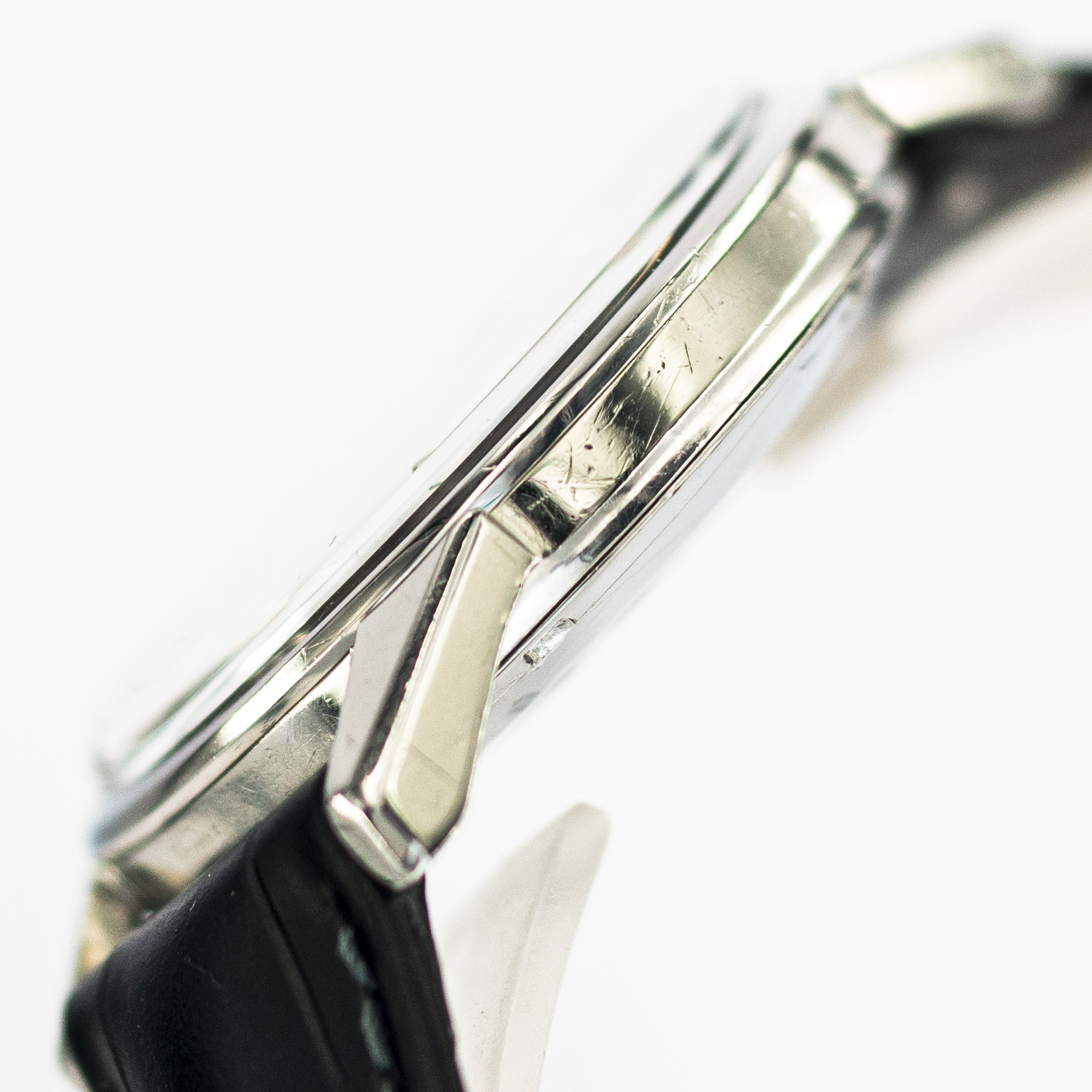 1426_marcels_watch_group_vintage_wristwatch_1961_omega_14390_seamaster_case_side_07