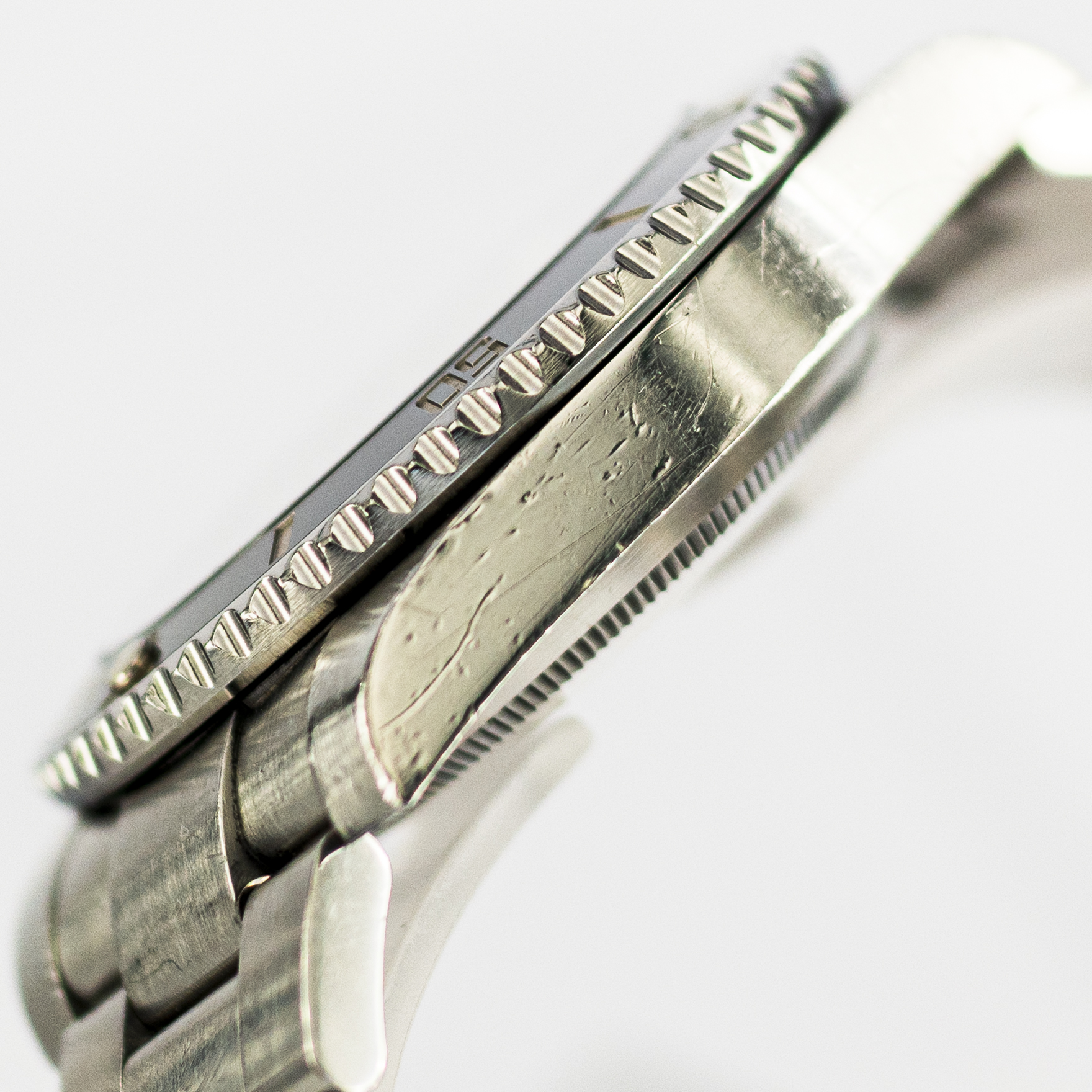 1429_marcels_watch_group_2013_rolex_114060_submariner_case_side_01