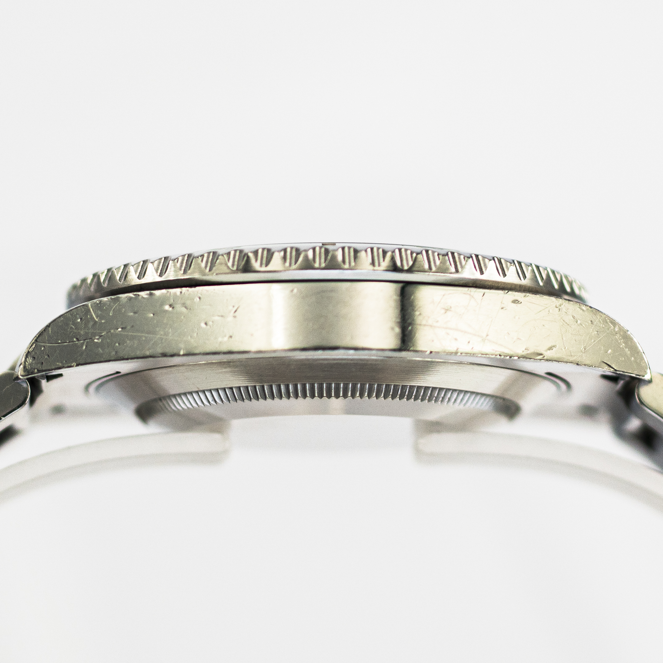 1429_marcels_watch_group_2013_rolex_114060_submariner_case_side_04