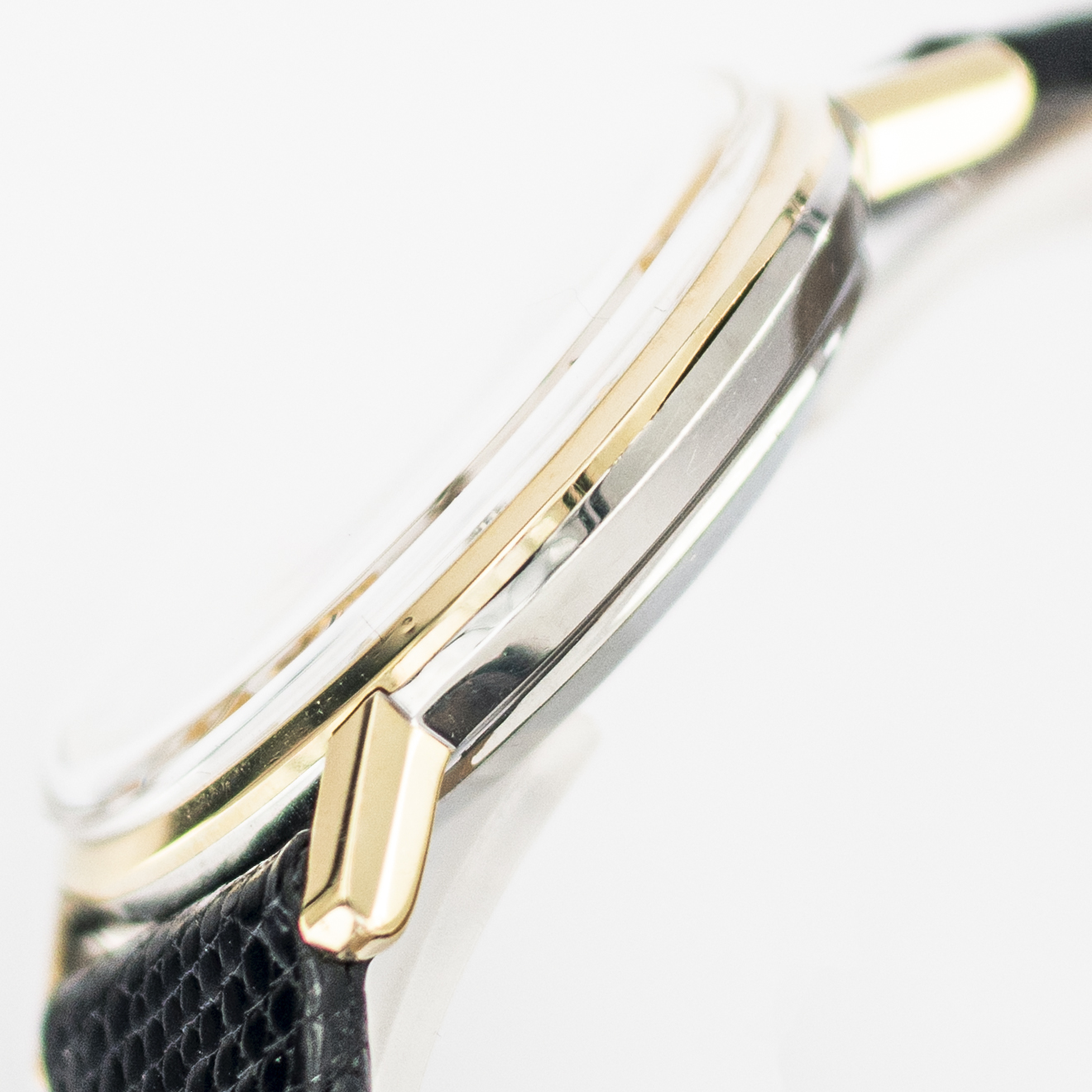 1568_marcels_watch_group_vintage_wristwatch_1967_omega_166.020_seamaster_de_ville_case_side_06