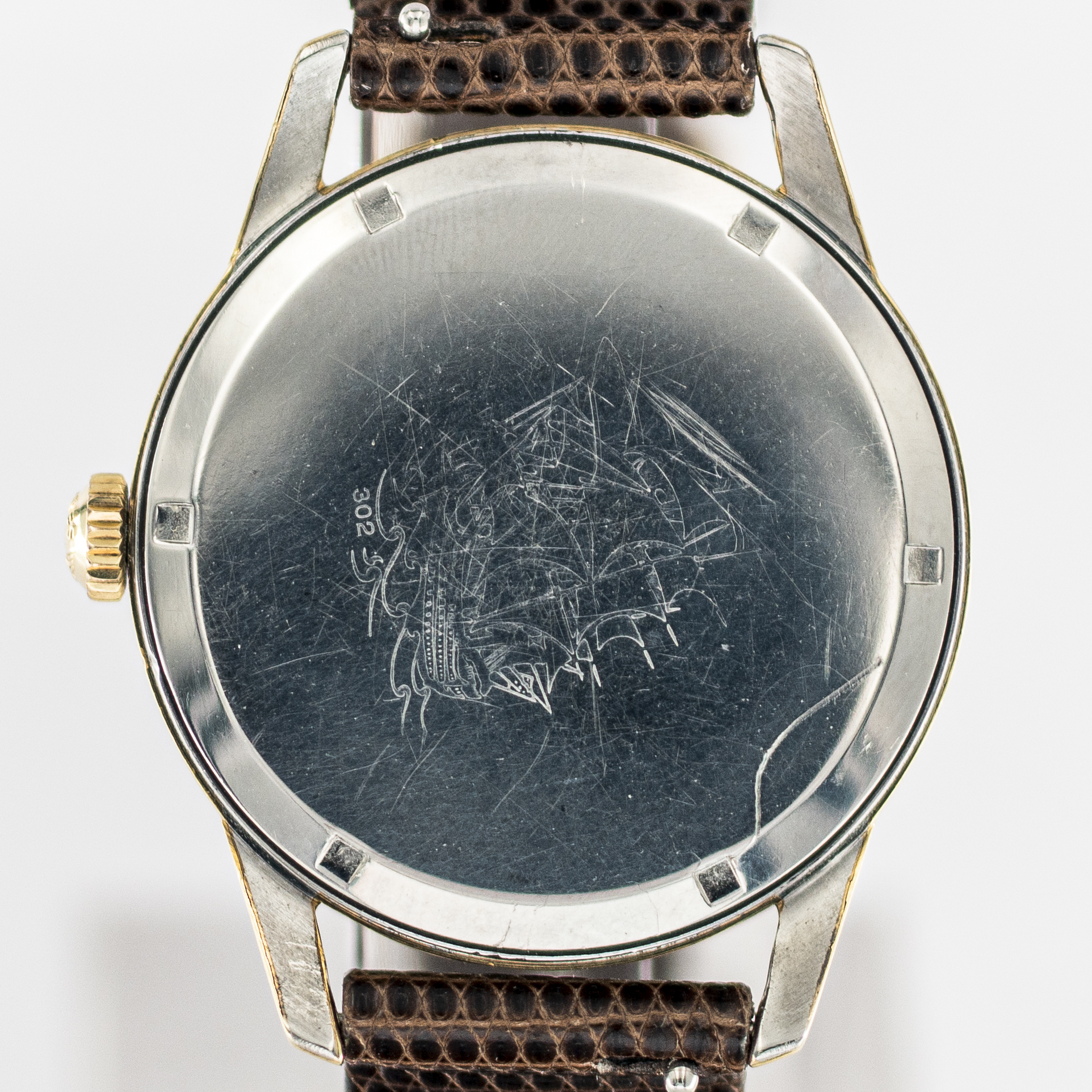 1583_marcels_watch_group_vintage_wristwatch_1961_longines_302_flagship_caseback_04