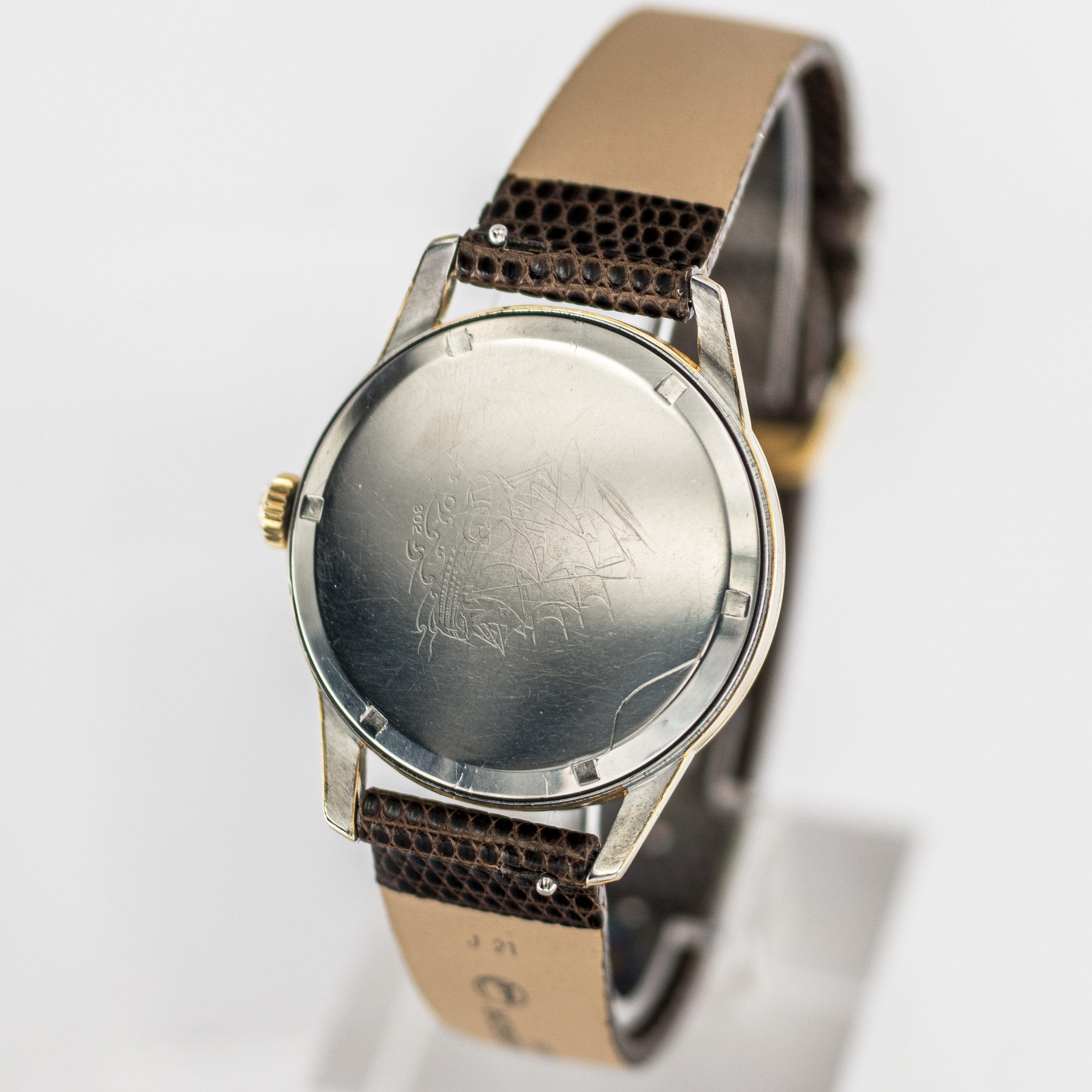 1583_marcels_watch_group_vintage_wristwatch_1961_longines_302_flagship_caseback_05