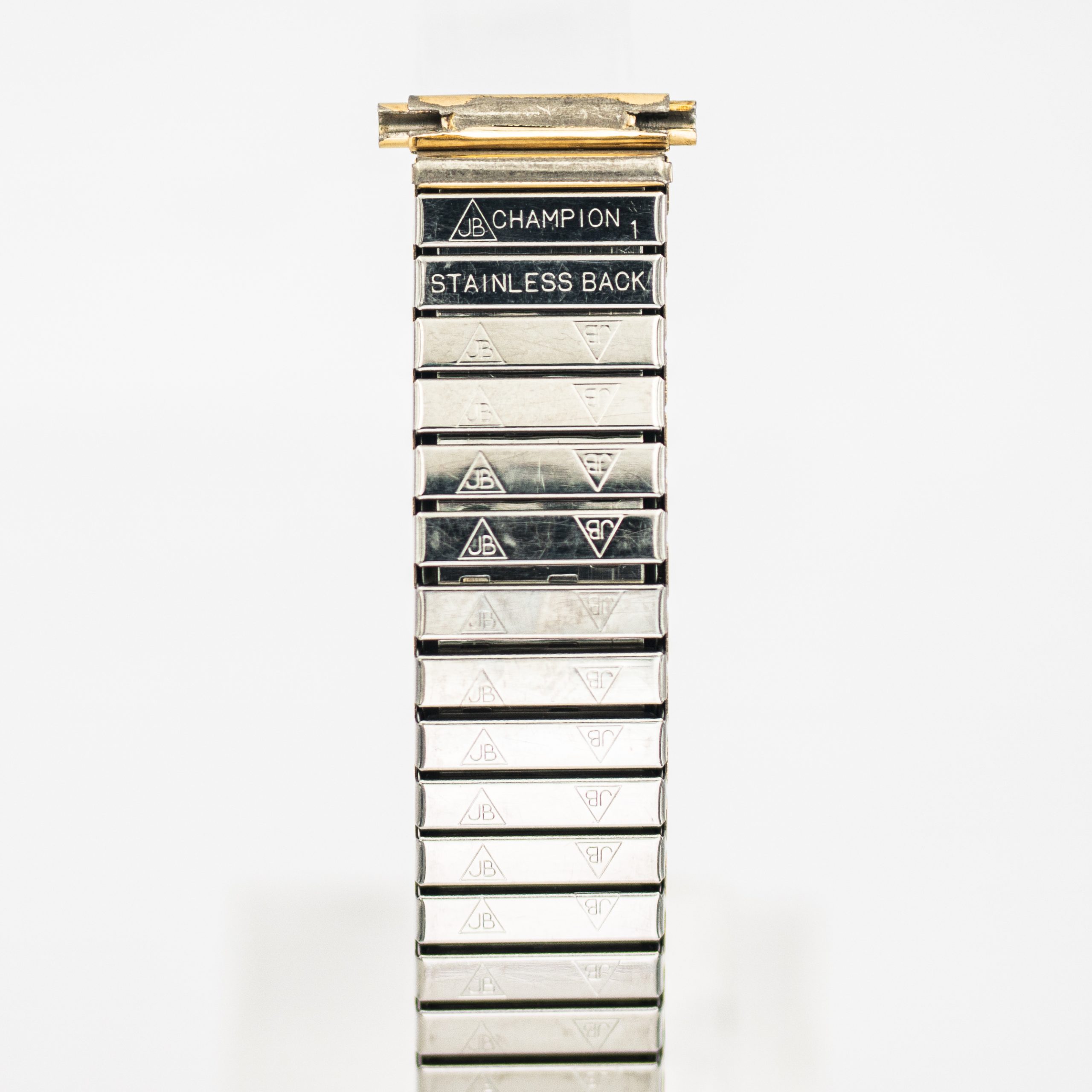 STR0146_marcels_watch_group_JB_champion_gold_on_steel_flexi_bracelet_1950s_05