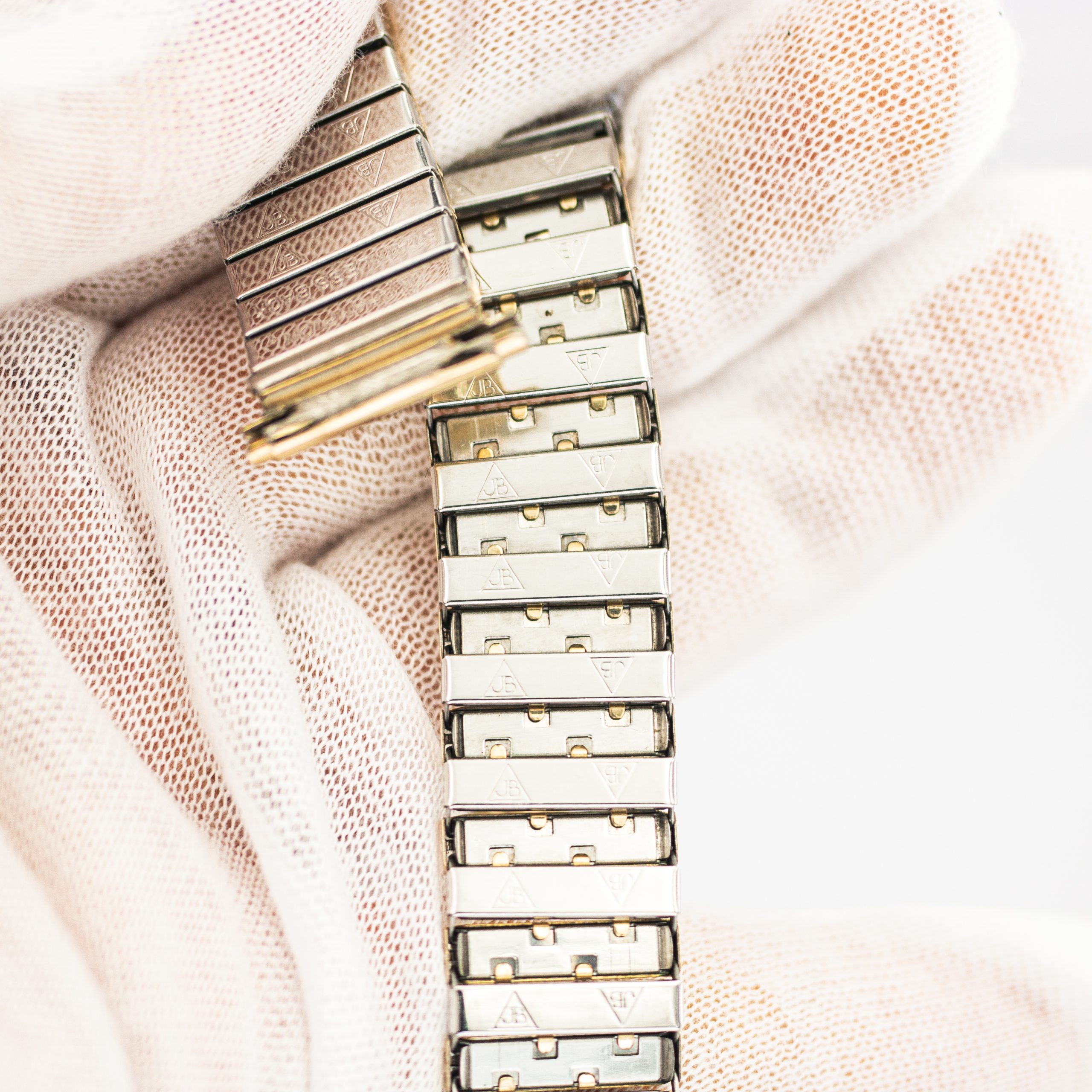 STR0146_marcels_watch_group_JB_champion_gold_on_steel_flexi_bracelet_1950s_09