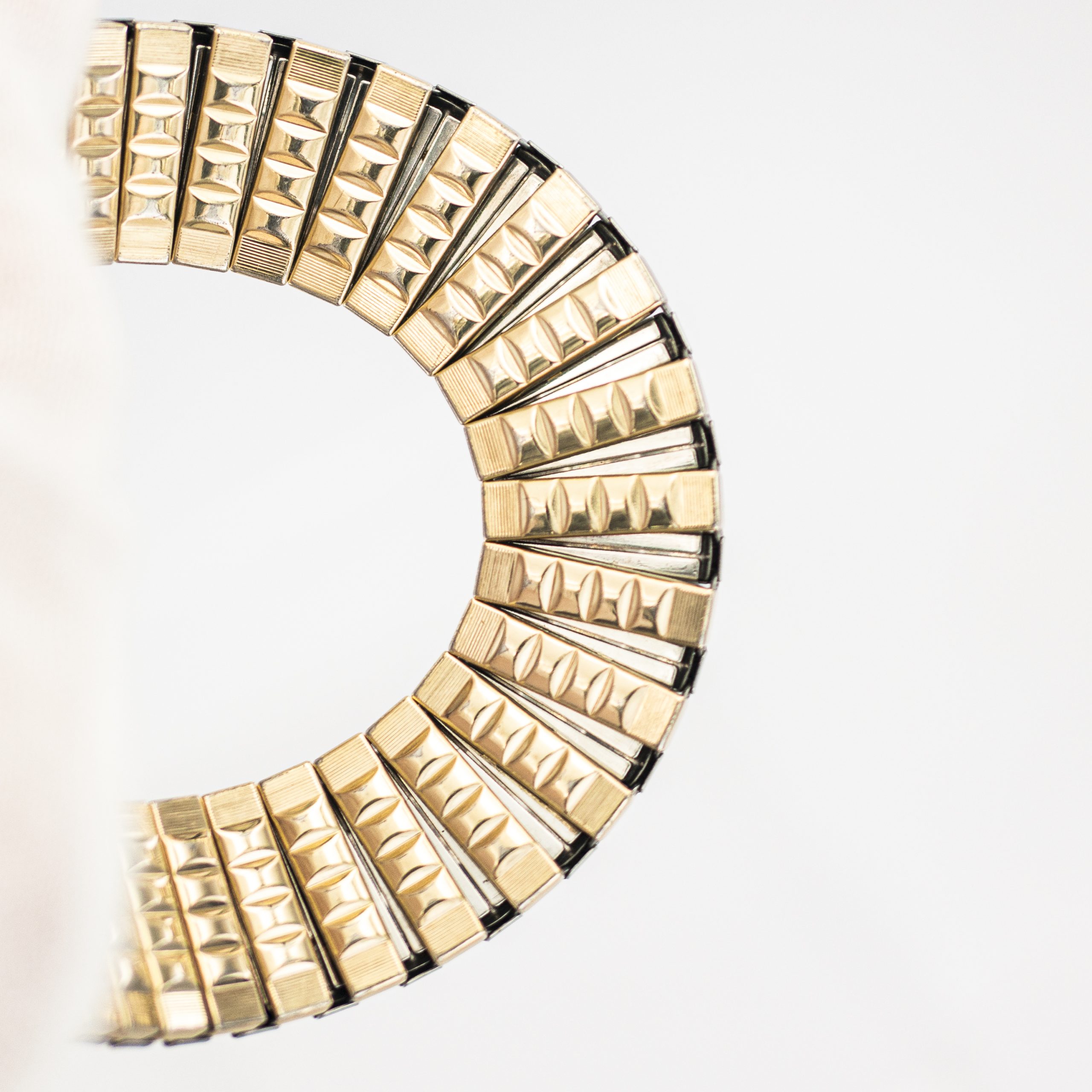 STR0146_marcels_watch_group_JB_champion_gold_on_steel_flexi_bracelet_1950s_10