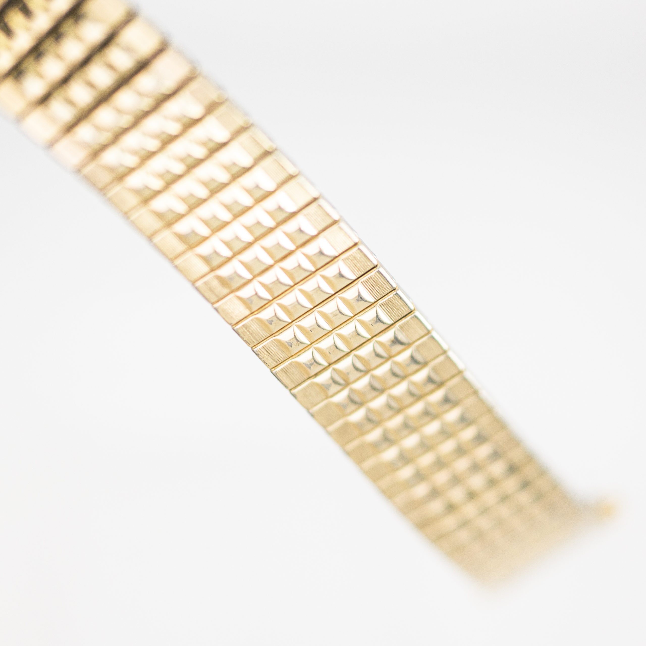 STR0146_marcels_watch_group_JB_champion_gold_on_steel_flexi_bracelet_1950s_14