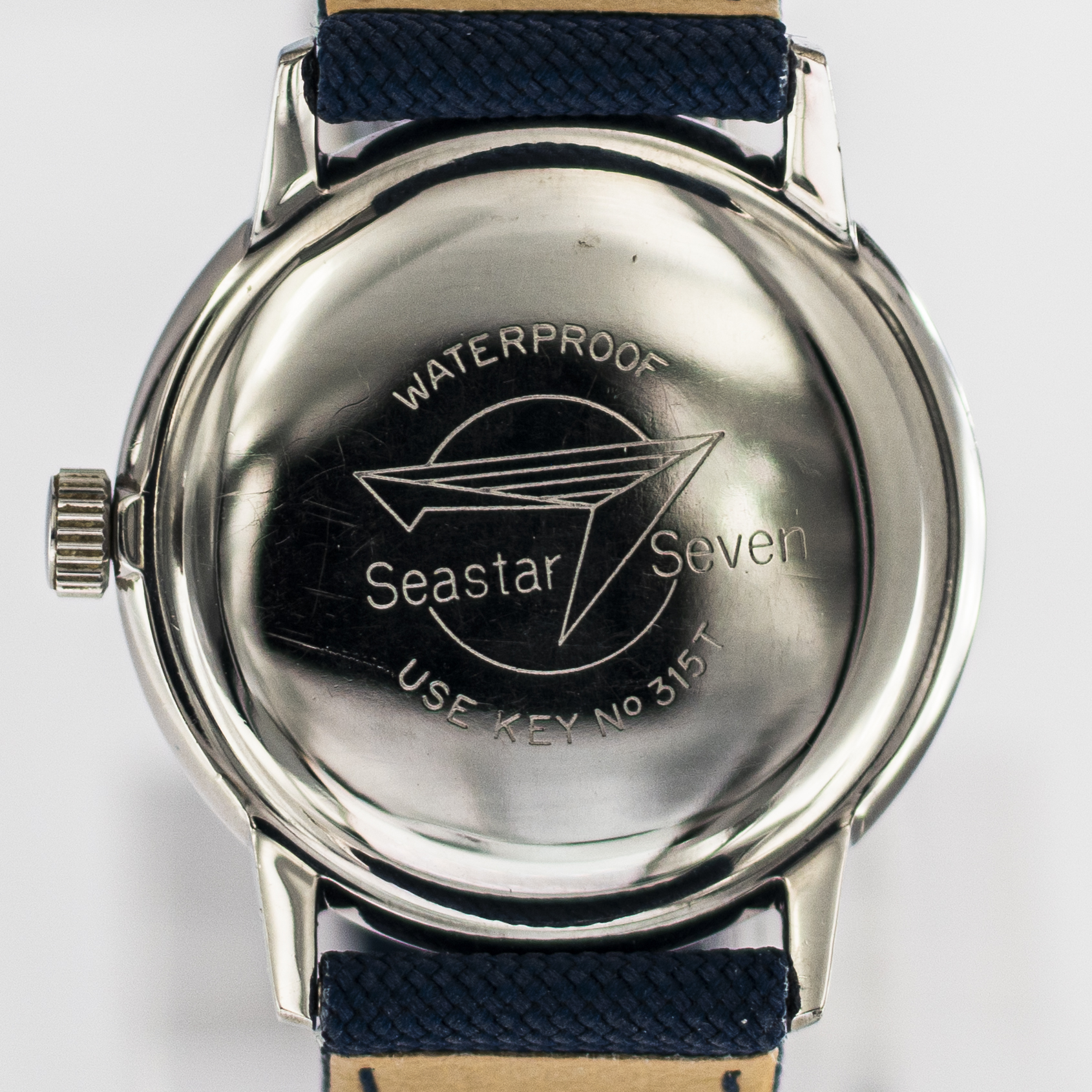 1589_marcels_watch_group_wristwatch_1962_vintage_tissot_42524_1_seastar_caseback_04
