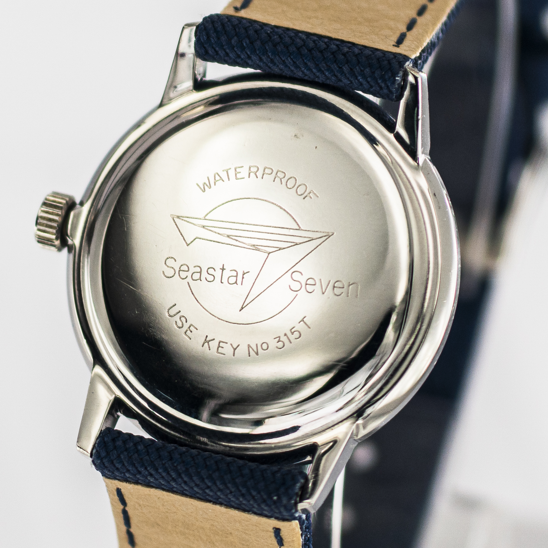 1589_marcels_watch_group_wristwatch_1962_vintage_tissot_42524_1_seastar_caseback_05