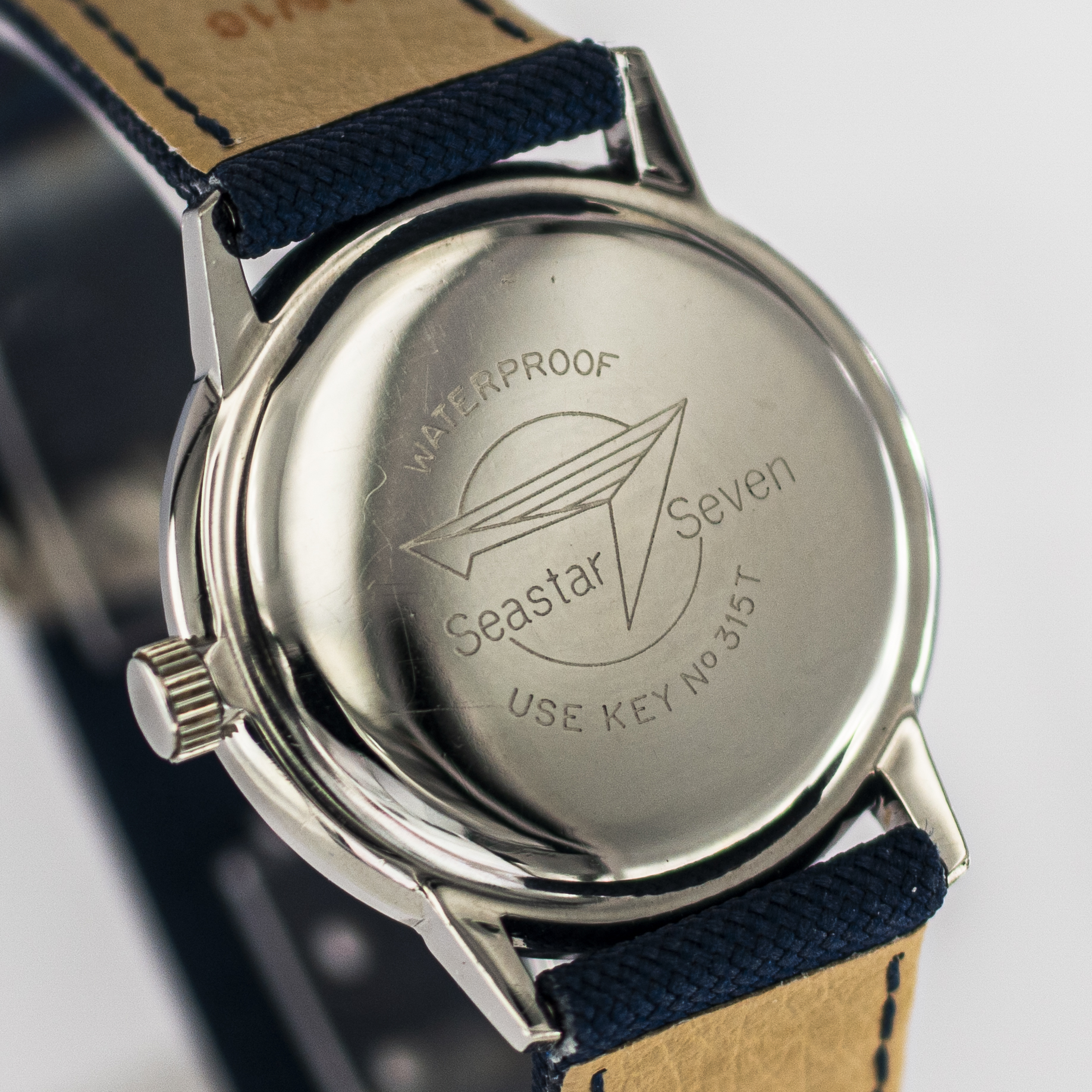 1589_marcels_watch_group_wristwatch_1962_vintage_tissot_42524_1_seastar_caseback_06