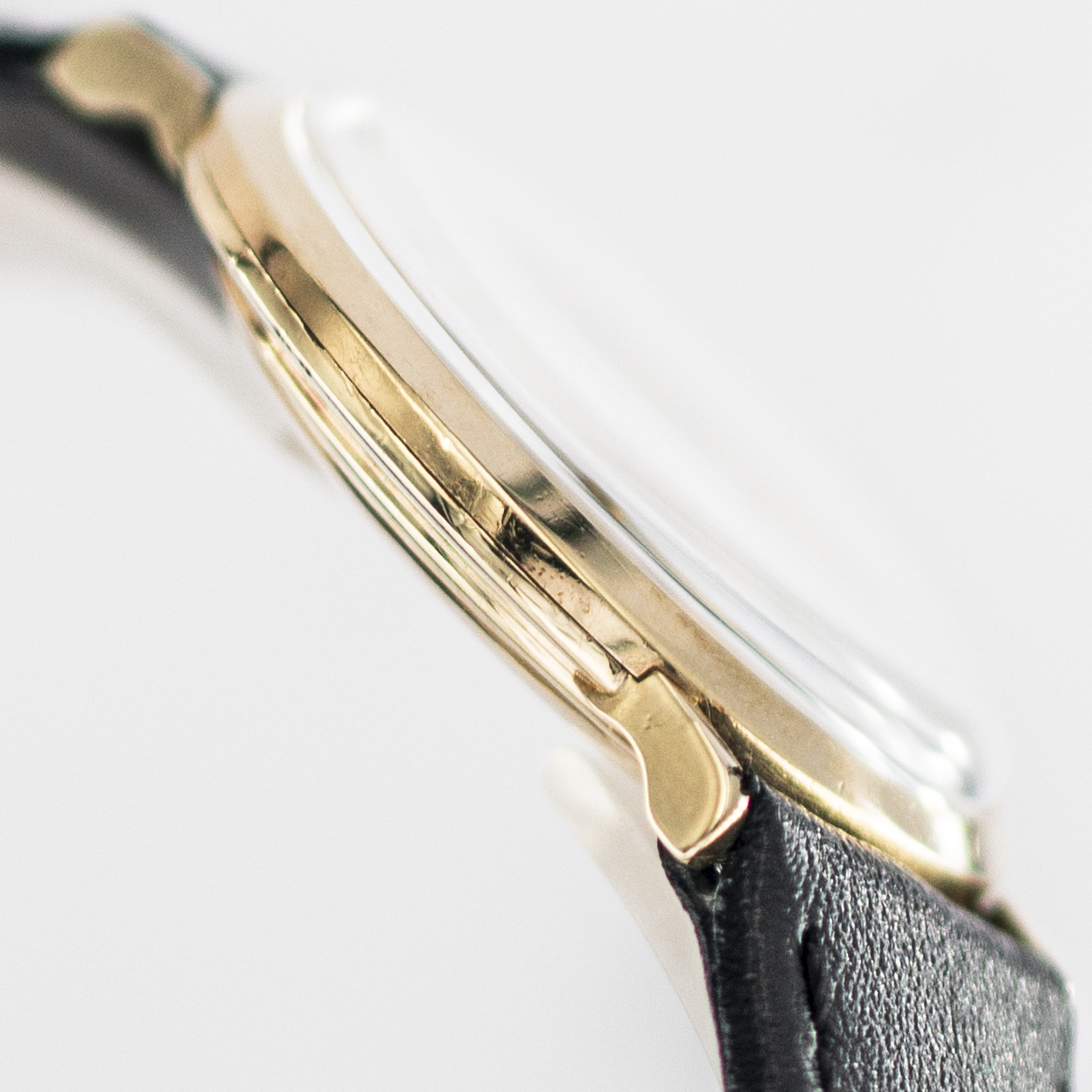 1593_marcels_watch_group_wristwatch_1957_vintage_longines_1010_203915_case_side_05