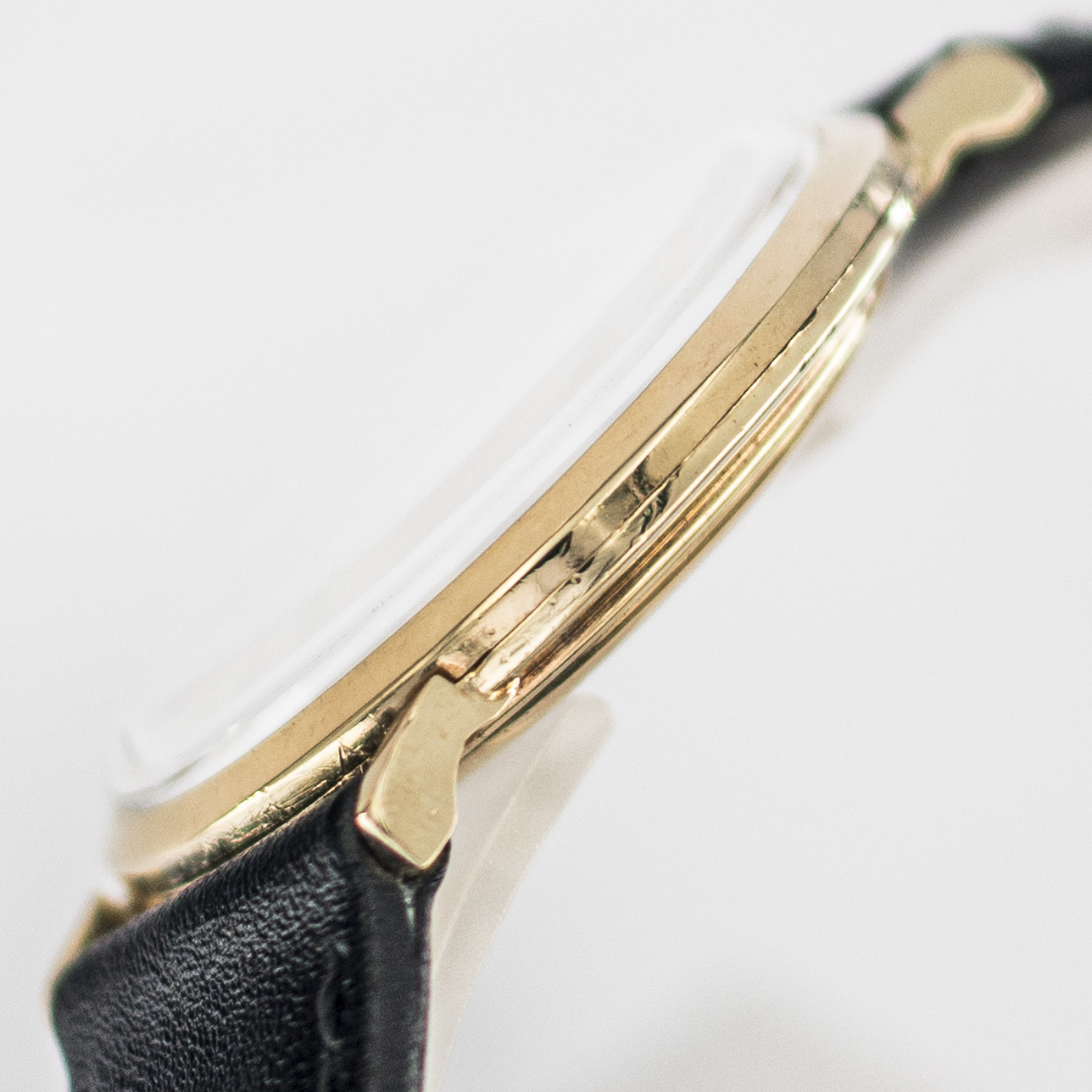 1593_marcels_watch_group_wristwatch_1957_vintage_longines_1010_203915_case_side_06