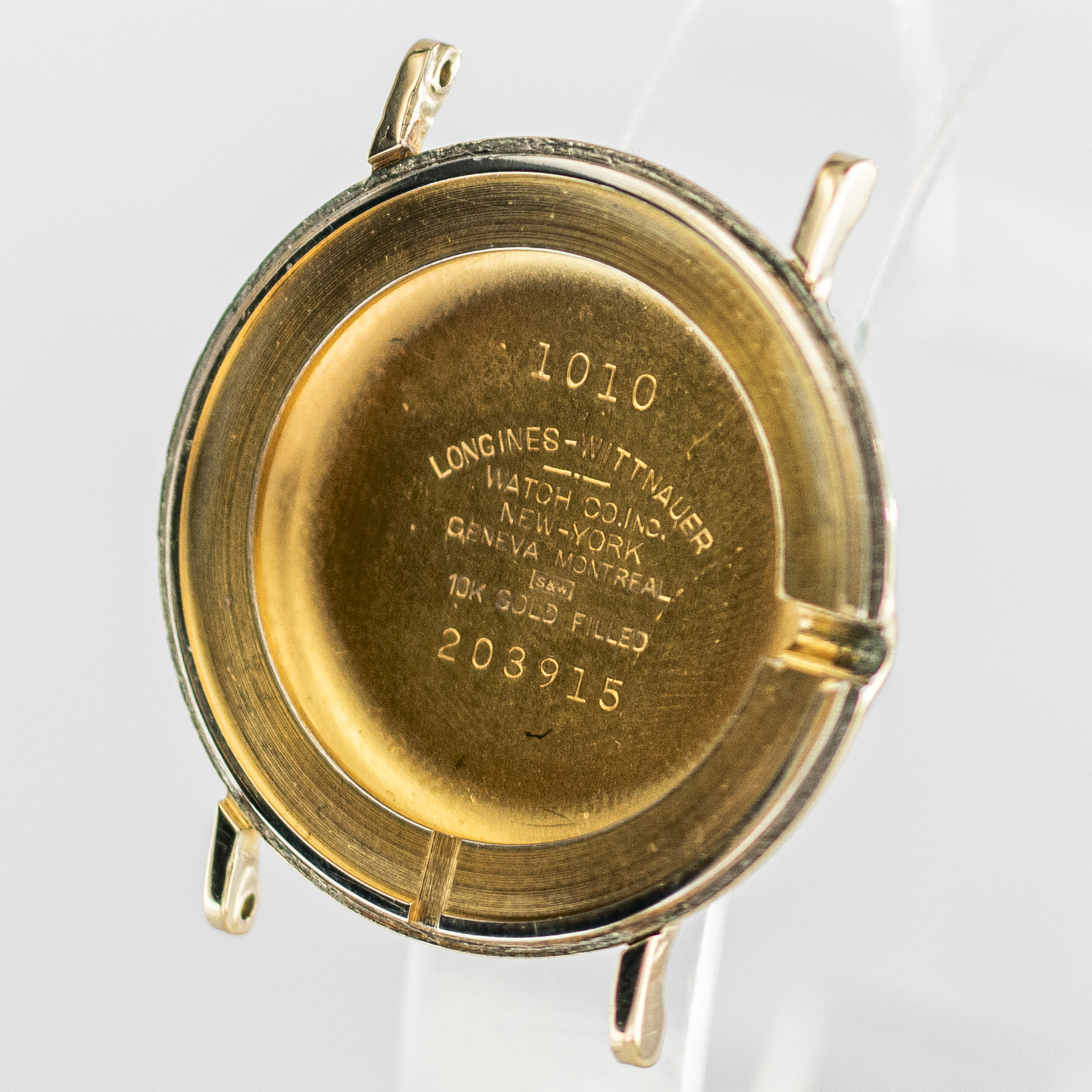 1593_marcels_watch_group_wristwatch_1957_vintage_longines_1010_203915_caseback_01