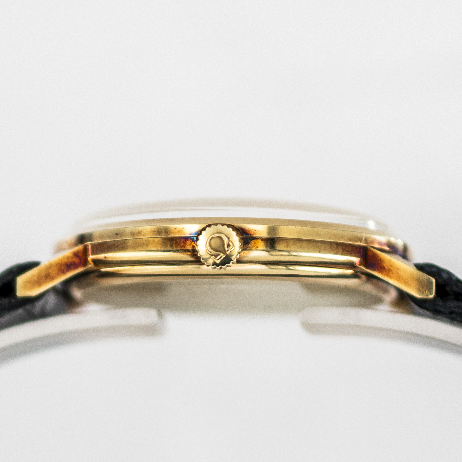 1607_marcels_watch_group_vintage_wristwatch_1970_omega_131.041_geneve_14K_case_side_01