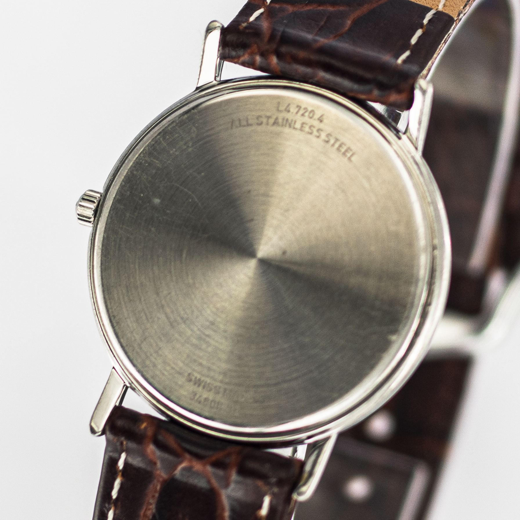1548_marcels_watch_group_wristwatch_1980s_vintage_longines_L4_720_4_présence_caseback_05