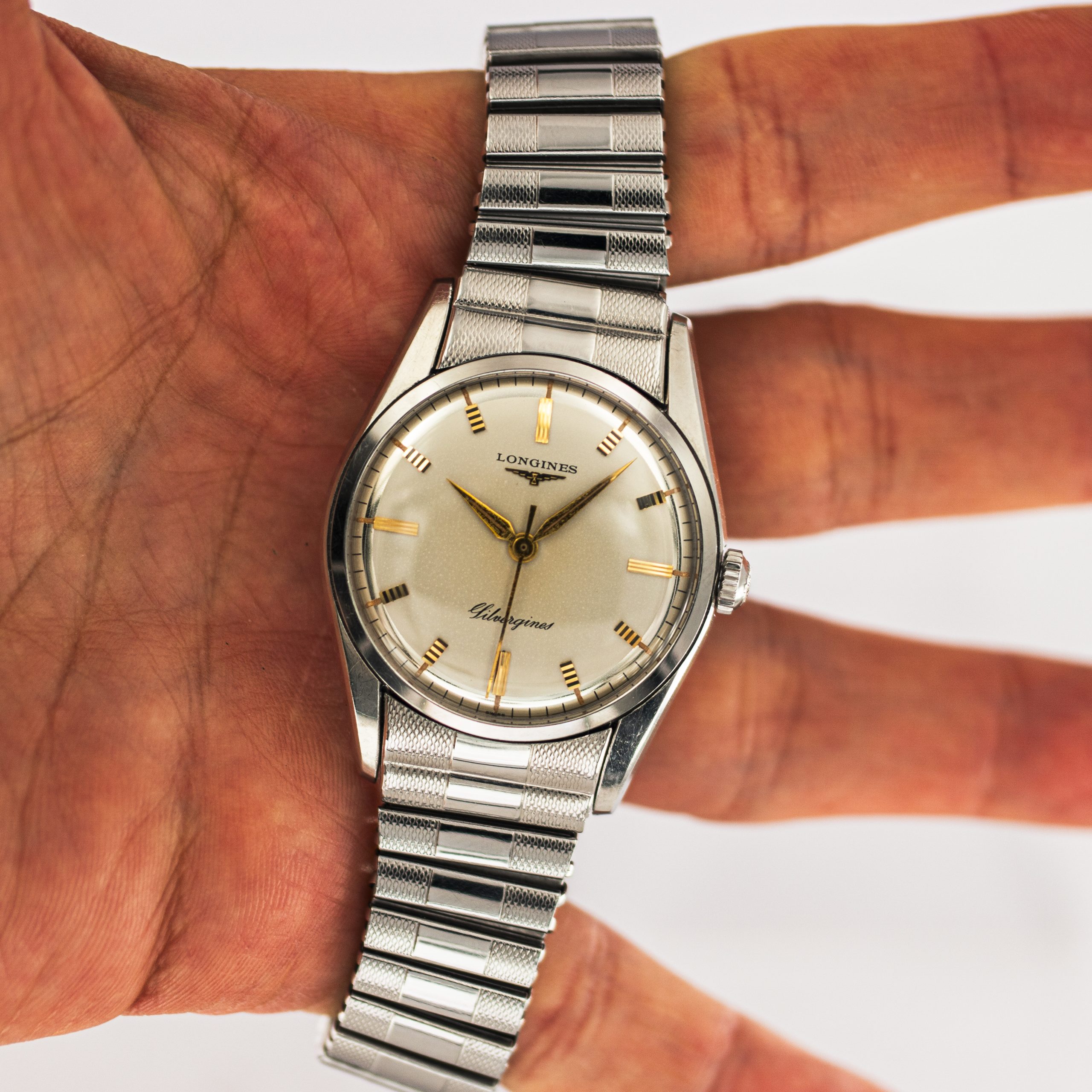 1628_marcels_watch_group_wristwatch_1957_vintage_longines_9100_4_silvergines_dial_11