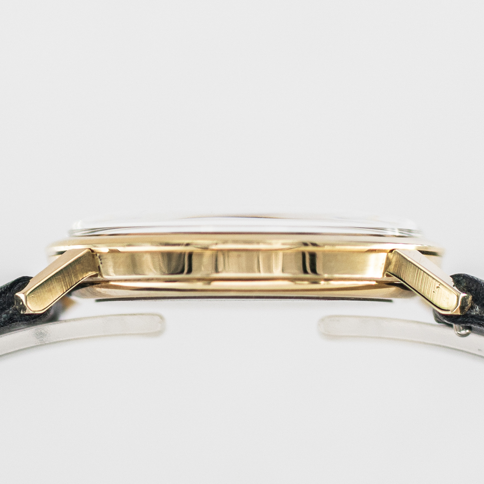 1636_marcels_watch_group_wristwatch_1968_vintage_omega_131.021_SP_geneve_14K_case_side_04