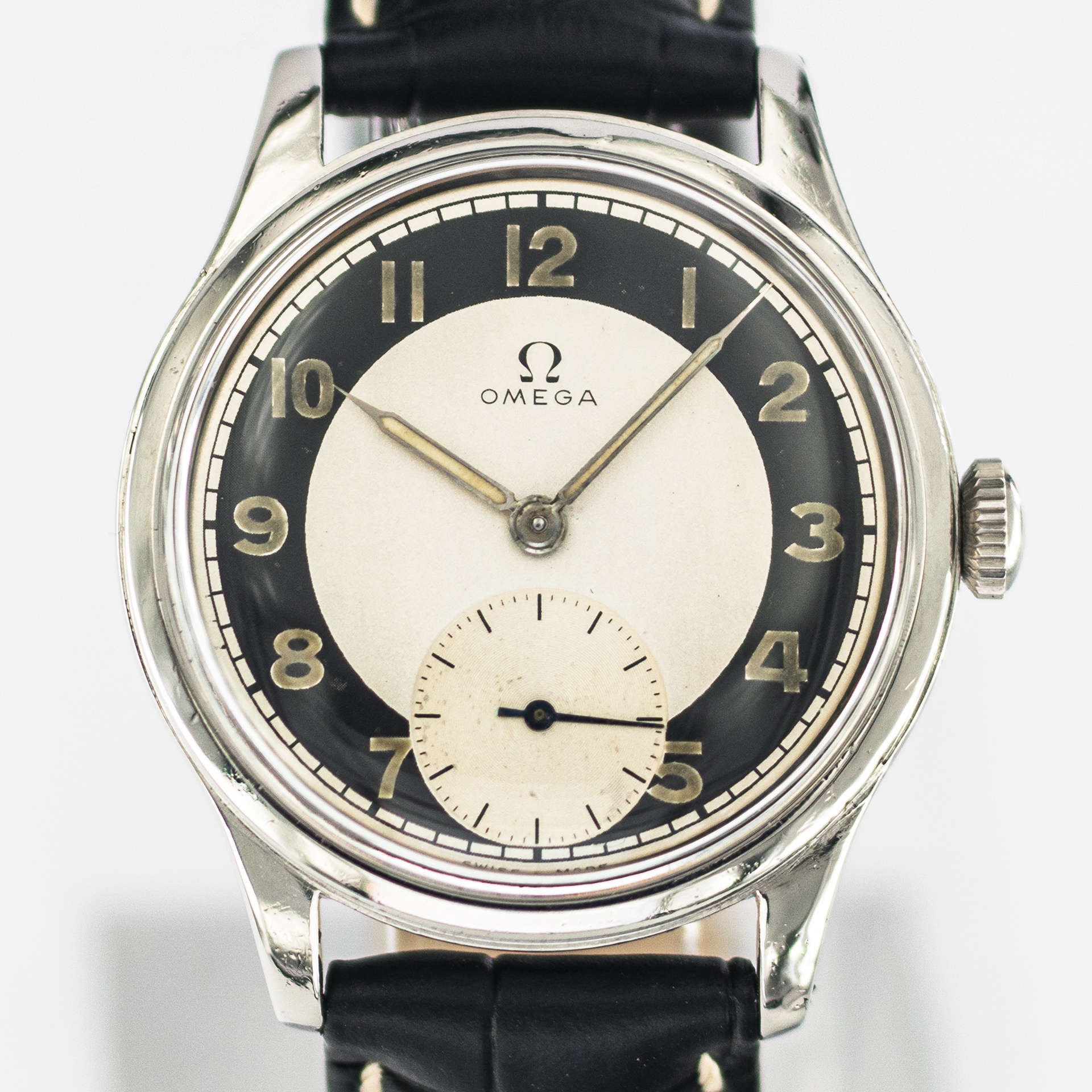 1638_marcels_watch_group_wristwatch_1947_vintage_omega_2400_5_suveran_dial_01